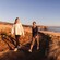 Two women walking on a pathway at Godley Head in Canterbury, New Zealand